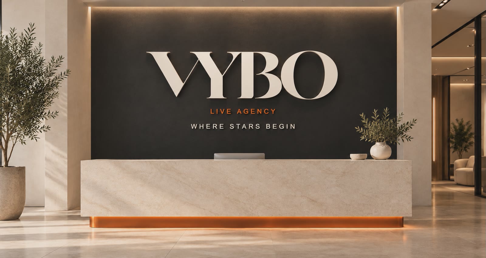 Concept render: cream VYBO letters, an orange Live Agency line, and Where Stars Begin, on a dark wall above a stone desk.